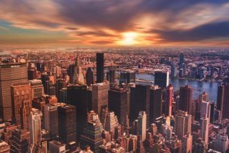 High Angle View Of Cityscape Against Cloudy Sky 313782