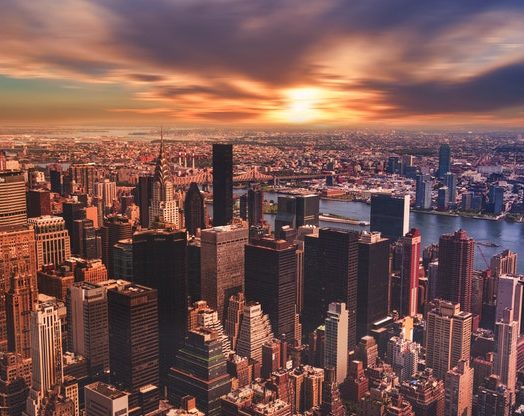 high angle view of cityscape against cloudy sky 313782